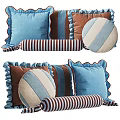 Stylish Decorative Pillows in Blue and Brown with Striped Round Shapes and Ruffled Edges