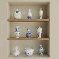 Traditional Blue And White Ceramic Vessels Displayed On Three Wooden Shelves In Wall Cabinet