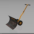Orange Wheeled Snow Shovel With Black Handle Wheels And Metal Blade