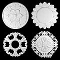 Golden Decorative Circular Embossed Discs With Floral Patterns And Intricate Designs 3d model