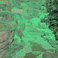 Natural Cave Interior With Rock Formations Stone Walls Moss And Pathway