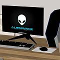 Modern Alienware Desktop Setup With Monitor Tower Keyboard Mouse On Wooden Home Office Desk