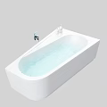 Modern White Bathtub Interior With Water Faucet And Toiletries On Edge