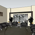 Hotel Public Lounge Area With Comfortable Seating Coffee Tables Decorative Paintings Plants And Patterned Carpet