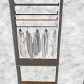 Light Hanging Clothes On Metal And Wooden Hanger Rods Against Gray Wall With Metal Shelf