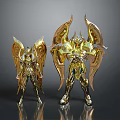 Large And Small Golden Armored Figures With Wings And Ornate Details On Gray Background