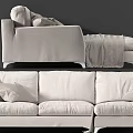 Light Colored Fabric Sectional Sofa With Pillows Ottoman And Throw Blanket 3d model