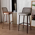 Modern Bar Stools With Woven Backrest Leather Seat And Wooden Legs In Indoor Space