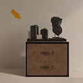 Modern Brown Nightstand With Drawers Metal Handles Green Black Containers White Candles And Black Sculpture