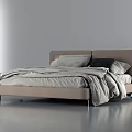 Modern Double Bed with Beige Headboard Gray Bedding and Pillows Including Black Accent 3d model