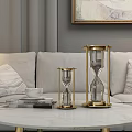 Modern Living Room Gold Framed Hourglass Decorations Set On Marble Coffee Table With Sofa
