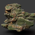 Natural Stacked Stone Formation With Mossy Surface And Varied Brown Green Color Tones