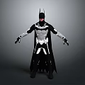 Man Wearing Black and White Batman Costume with Cape Standing on Gray Background