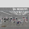 Modern Clothing Store Interior with Hanging Apparel Shelves Display Tables and Colorful Outfits