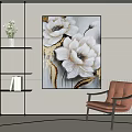 Botanical Painting With White Flowers Gold Accents In Interior Featuring Brown Chair And Wall Shelves