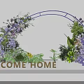Purple Floral Arch Decoration with Welcome Home Sign and Greenery Plants