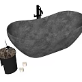 Freestanding Gray Concrete Oval Bathtub With Black Faucet Marble Side Table And White Candles