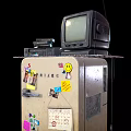 Vintage CRT Television Placed on a Cabinet with Colorful Stickers and Decorations