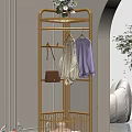 Elegant Golden Clothes Rack with Hooks Holding Clothes and Handbag in Modern Interior