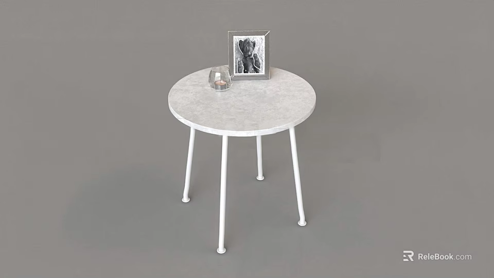 Modern White Round Top Side Table With Picture Frame And Small Glass Decor 3d model