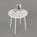Modern White Round Top Side Table With Picture Frame And Small Glass Decor 3d model