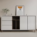 Modern White Entryway Side Cabinet With Drawers Open Shelf Green Plant And Decorative Painting