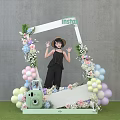 Instagrammable Photo Check-in Spot With White Frame Vibrant Flowers Balloons Green Camera Green Lawn