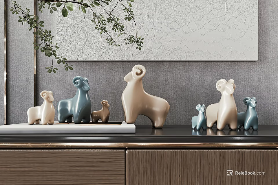 Blue And Beige Decorative Sheep Figurine Ornament Set On Cabinet With Plant Accents 3d model 