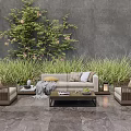 Outdoor Sofa Set With Wicker Chairs Coffee Table And Green Plants Against Gray Wall