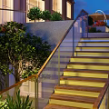 Outdoor Staircase with Glass Railing and Wooden Steps Illuminated Evening with Greenery and Building Background