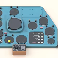 Blue Industrial Equipment Control Panel With Multiple Black Knobs Circular Buttons And Dials