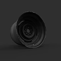 Black Automotive Wheel With Metallic Surface And Multiple Bolt Holes Design