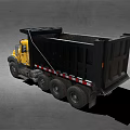 Yellow Heavy Duty Dump Truck With Black Bed And Large Wheels
