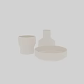 White Ceramic Bowl Plate Cup And Vase With Speckled Linear Design On Black Background