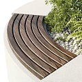 Modern Tree Planter with Lush Green Trees and Fresh Plants in Urban Garden