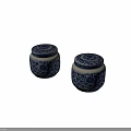 Pair of Blue and White Ceramic Jars with Intricate Floral Patterned Lids