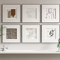 Abstract Paintings In White Frames On Wall With Shelf Green Plant And Geometric Decor 3d model