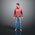 Man Wearing Red Jacket and Blue Jeans Standing Against Gray Background