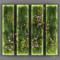 Green Plant Wall with Various Greenery Pink Blossoms and Indoor Decorative Design