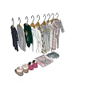 Kids Clothes Hanging On Hangers With Various Styles Colorful Outfits And Folded Clothes