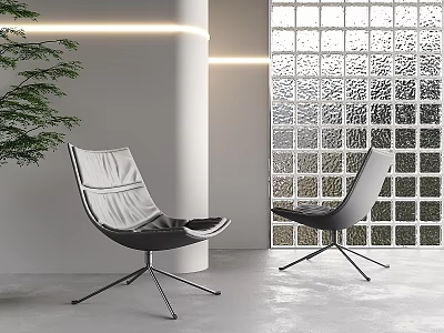 Two Modern Black Leather Accent Chairs With Metal Legs In Interior With Glass Block Wall 3d model