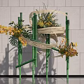 Modern Bamboo Decorative Structure With Yellow Flowers Green Plants Against Gray Wall