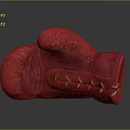 Red Leather Boxing Glove With White Laces On Dark Background