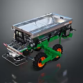 Green Agricultural Machinery With Silver Hopper Large Wheels And Orange Rims