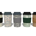 Modern Coffee Cup Set with Various Patterned Sleeves and Colorful Designs
