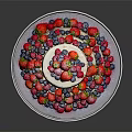 Three Tier Naked Cake Topped With Fresh Berries And Fruits On Silver Stand