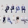 Group of Business Professionals Sitting in Diverse Poses With Formal Attire