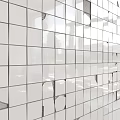 White Tiled Wall With Neatly Arranged Square Tiles And Some Chipped Edges