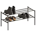 Various Style Shoes Arranged On Black Metal Multi Layer Shoe Rack