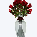 Bouquet of Red Roses in Transparent Vase with Green Leaves and Red Wire Decoration